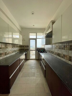 Kitchen in 3 BHK Apartment at Sushma Crescent, Dhakoli – for Sale