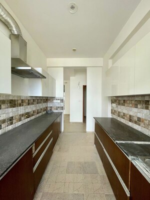 Kitchen in 3 BHK Apartment at Sushma Crescent, Dhakoli – for Sale