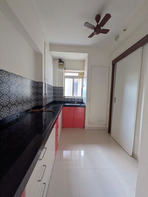 Kitchen in 1.5 BHK Apartment at Lodha Amara Tower 23, Kolshet Road – for Rent