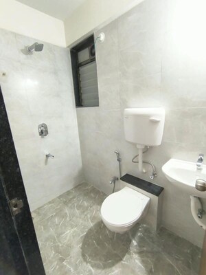 Bathroom in 1 BHK Apartment at Anant Metropolis Insignia Towers, Kasarvadavali – for Rent