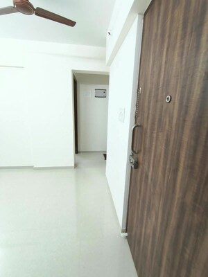 Building Lobby in 1 BHK Apartment at Anant Metropolis Insignia Towers, Kasarvadavali – for Rent