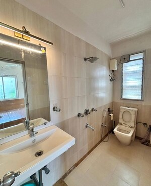 Bathroom in 3 BHK Apartment at Beach Queen, Juhu – for Rent