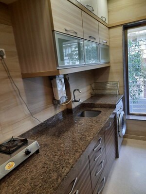 Kitchen in 1 BHK Apartment at Peddar Road – for Sale