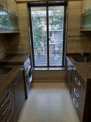 Kitchen in 1 BHK Apartment at Peddar Road – for Sale