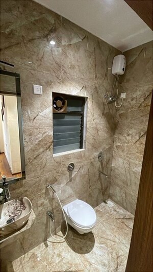 Bathroom in 2 BHK Apartment at Raunak Fortuna, Shilphata – for Sale