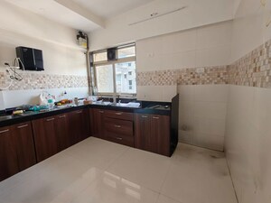 Kitchen in 1 BHK Apartment at Heritage Shakuntala Mahal, Chembur – for Sale