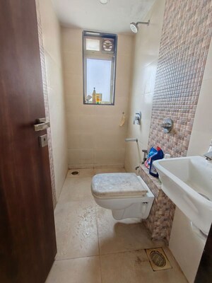 Bathroom in 1 BHK Apartment at Heritage Shakuntala Mahal, Chembur – for Sale