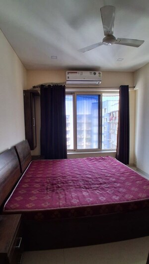 Bedroom in 2 BHK Apartment at Rizvi Oak, Malad East – for Rent