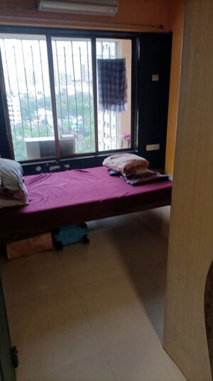 Bedroom in 3 BHK Apartment at Joy Homes CHS Ltd, Bhandup West – for Sale