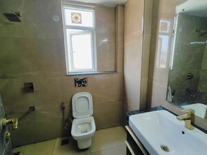 Bathroom in 3 BHK Apartment at Smart World Orchard, Sector 61 – for Rent