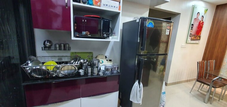 Kitchen, kumar-pebble-park 2 Bedroom 950 Sq.Ft. Apartment In Hadapsar Pune 10722282
