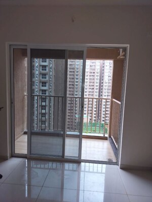 Room in 2 BHK Apartment at Godrej Green Vistas, Mahalunge – for Sale