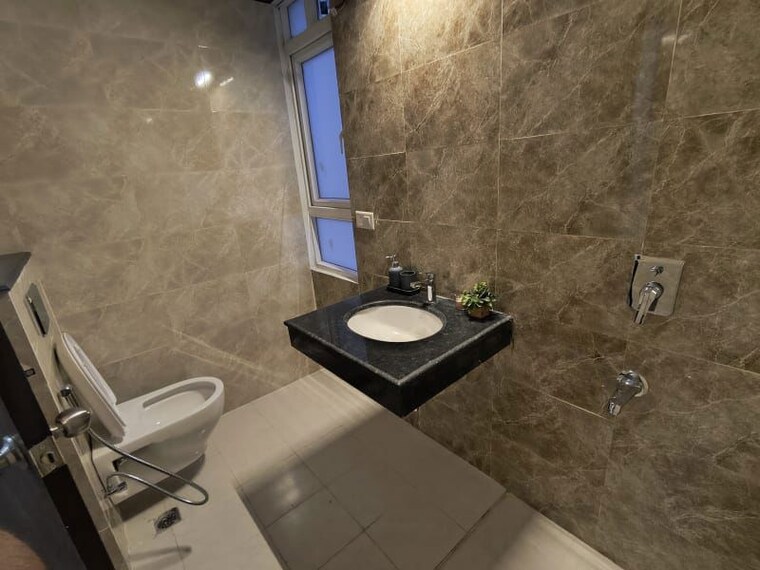 Bathroom, hero-homes-gurgaon 3 Bedroom 1689 Sq.Ft. Apartment In Sector 104 Gurgaon 10722304