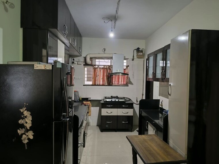 Kitchen, wadhwani-ganeesham 2 Bedroom 950 Sq.Ft. Apartment In Pimple Saudagar Pune 10722346
