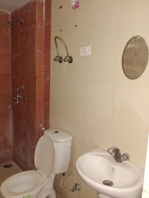 Bathroom in 3 BHK Apartment at Mahagun My Woods, Sector 16c Greater Noida – for Rent