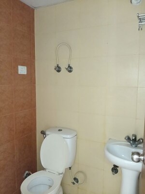 Bathroom in 3 BHK Apartment at Mahagun My Woods, Sector 16c Greater Noida – for Rent