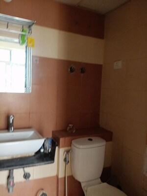 Bathroom in 3 BHK Apartment at Mahagun My Woods, Sector 16c Greater Noida – for Rent