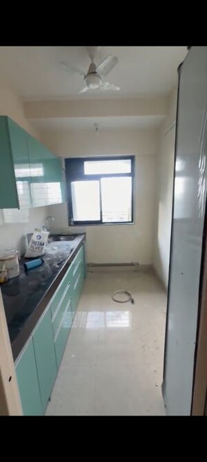 Kitchen in 1 BHK Apartment at Kaveri Apartments Tilak Nagar, Goregaon West – for Rent