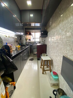 Kitchen in 1 BHK Apartment at AR Rayyan Tower, Agripada – for Sale
