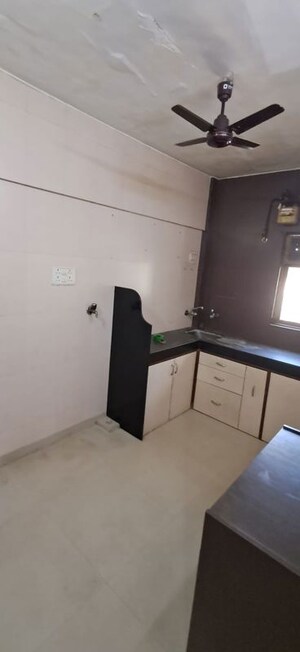 Kitchen in 1 BHK Apartment at Lokhandwala Complex, Andheri West – for Rent