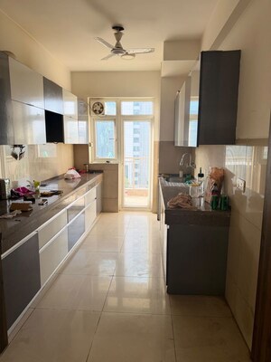 Kitchen in 3 BHK Apartment at Emaar Palm Gardens, Sector 83 – for Sale