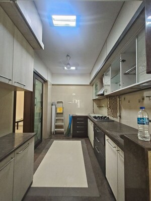 Kitchen in 3 BHK Apartment at DB Realty Shagun Towers, Goregaon East – for Rent