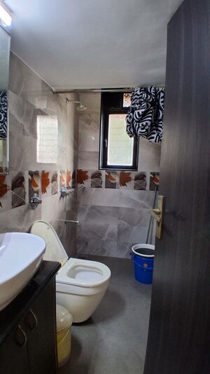 Bathroom in 2 BHK Apartment at Raheja Township, Malad East – for Rent