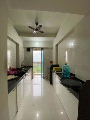Kitchen in 1 BHK Apartment at Uma Elements, Daighar Gaon – for Sale