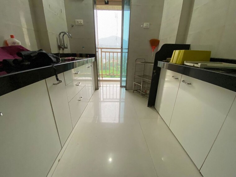 Kitchen, uma-elements 1 Bedroom 430 Sq.Ft. Apartment In Daighar Gaon Thane 10722538