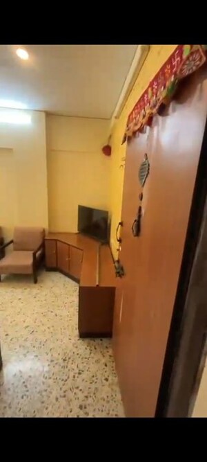 Living Room in 1 BHK Apartment at Lokhandwala Premium Towers, Andheri West – for Rent