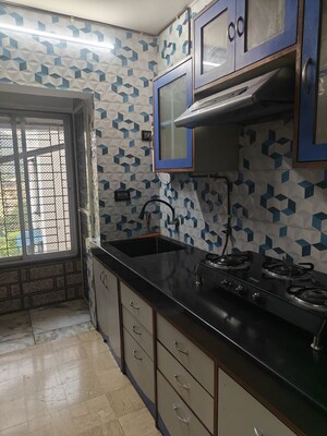 Kitchen in 2 BHK Apartment at Ahuja Harbour Estate , Nerul Sector 19a – for Rent