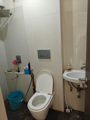 Bathroom in 1 BHK Apartment at Ruparel Elara, Kandivali West – for Rent