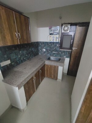 Kitchen in 1.5 BHK Builder Floor at Sector 26 – for Rent