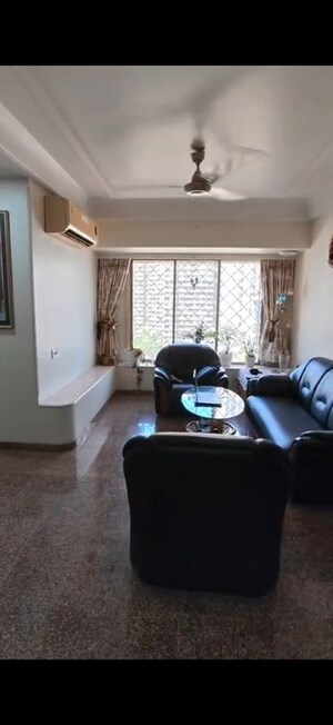 Living Room in 2 BHK Apartment at RNA Heights, Andheri East – for Rent