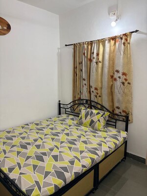 Bedroom in 2 BHK Apartment at Morya Yash Plaza, Chikhali – for Rent