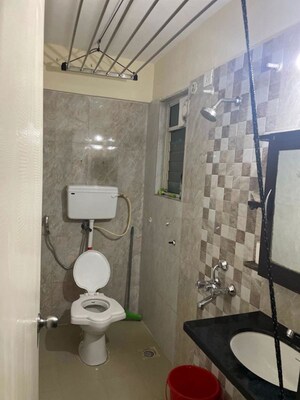 Bathroom in 2 BHK Apartment at Rohan Silver Gardenia, Ravet – for Rent