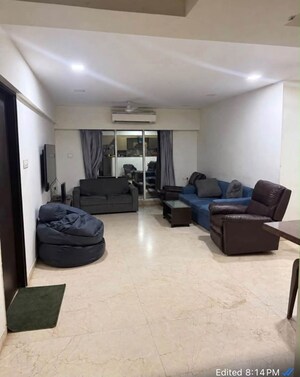 Living Room in 1 BHK Apartment at Lodha Woods, Kandivali East – for Rent