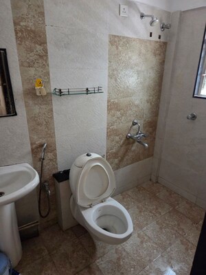 Bathroom in 2 BHK Apartment at GK Dwarka Sai, Rahatani – for Rent