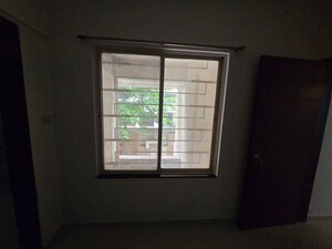 Room in 2 BHK Apartment at GK Dwarka Sai, Rahatani – for Rent
