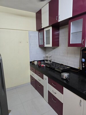 Kitchen in 2 BHK Apartment at GK Dwarka Sai, Rahatani – for Sale