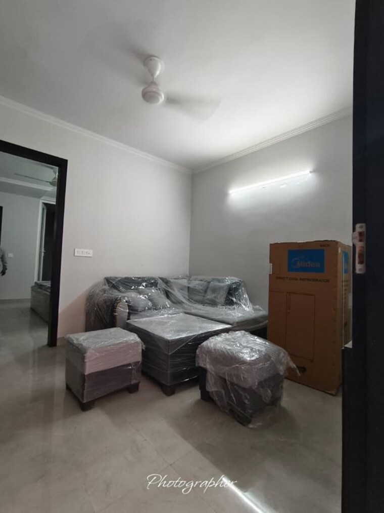 Living Room, unitech-the-residences-sector-33 2 Bedroom 1125 Sq.Ft. Apartment In Sector 33 Gurgaon 10723103
