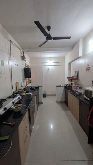 Kitchen in 2 BHK Apartment at Sucasa CHSL, Wakad – for Rent