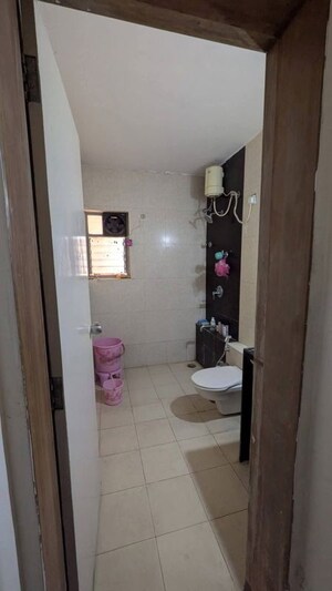 Bathroom in 2 BHK Apartment at Sucasa CHSL, Wakad – for Rent