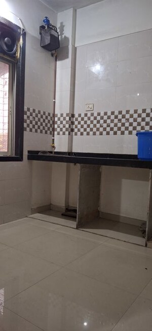 Kitchen in 1 BHK Apartment at Mangalmurti Twinkle Residency, Ghansoli Sector 21 – for Rent