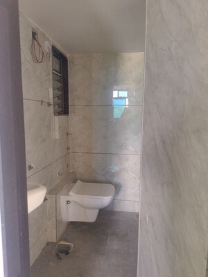 Bathroom in 1 BHK Apartment at Dhanlaxmi Dhananjay Hill View, Nalasopara West – for Rent