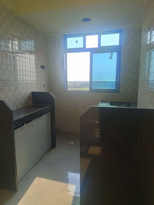 Kitchen in 1 BHK Apartment at Dhanlaxmi Dhananjay Hill View, Nalasopara West – for Rent
