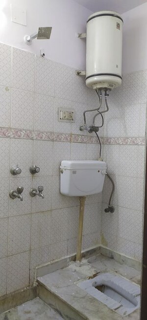 Bathroom in 2 BHK Builder Floor at Khirki Extension – for Rent