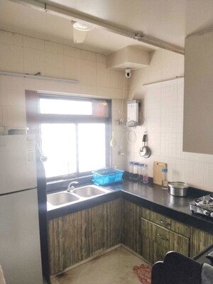 Kitchen in 2 BHK Apartment at Aum Sahil Tower, Lower Parel – for Sale