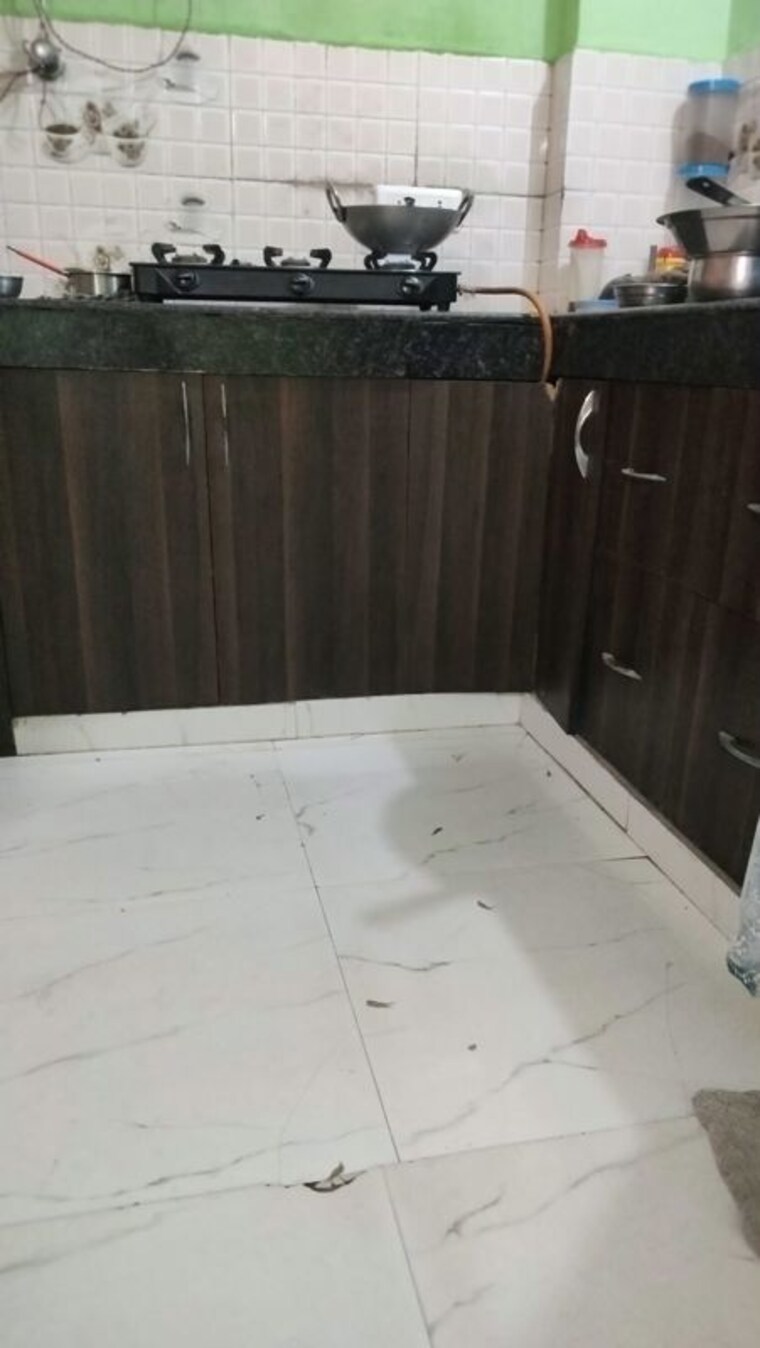 Kitchen, buildlopers-hi-tech-homes 2 Bedroom 650 Sq.Ft. Builder Floor In Sector 104 Noida 10723526