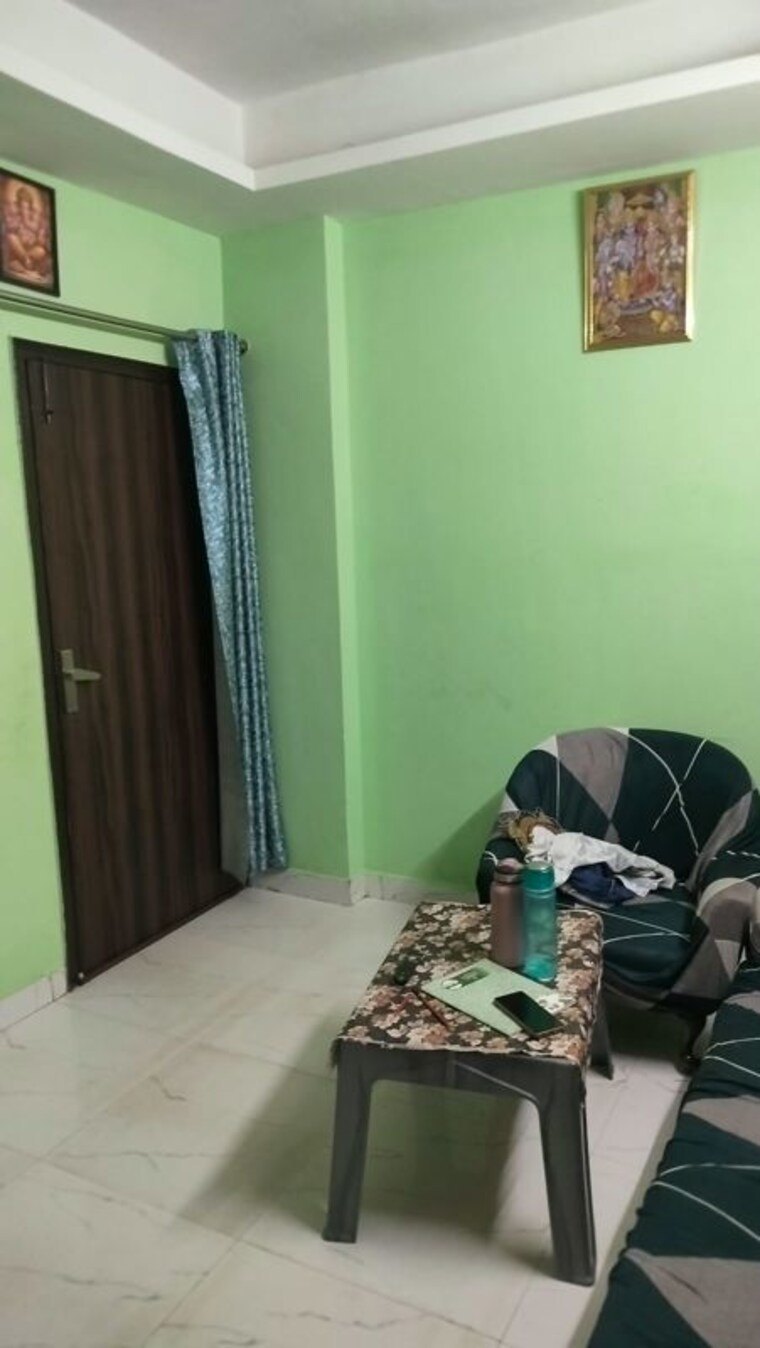 Living Room, buildlopers-hi-tech-homes 2 Bedroom 650 Sq.Ft. Builder Floor In Sector 104 Noida 10723526
